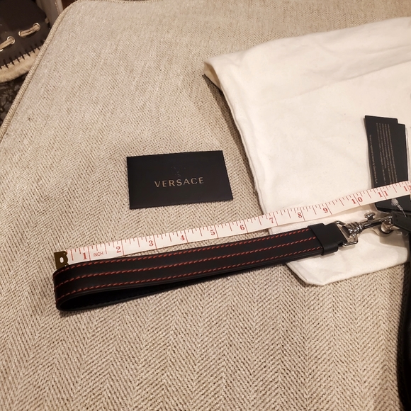 Brand new Versace leather clutch wrislet